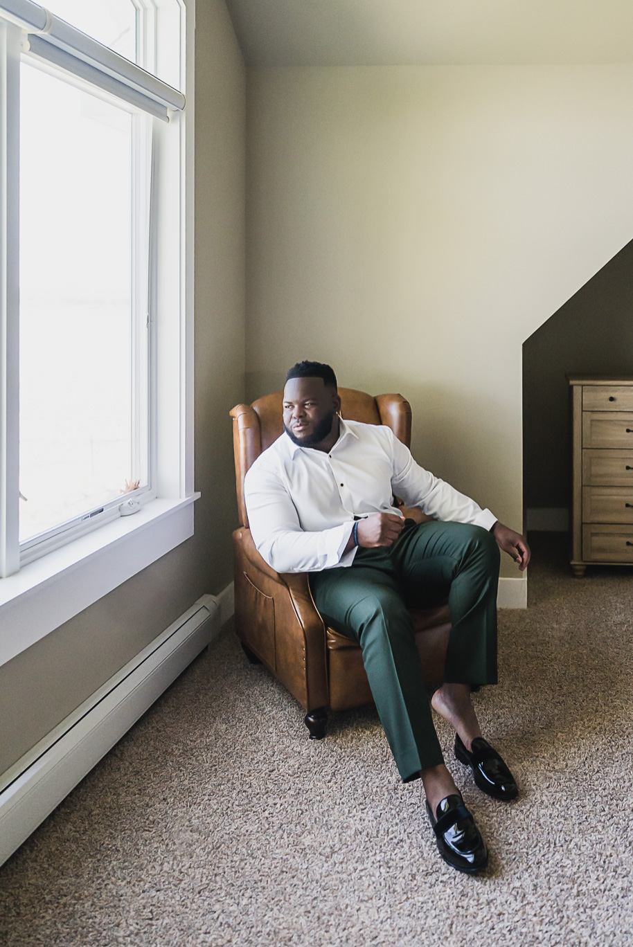 An emerald and gold fall interracial Castle Farms wedding in Charlevoix Northern Michigan by top-rated Northern Michigan wedding photography team Kari Dawson + Co.