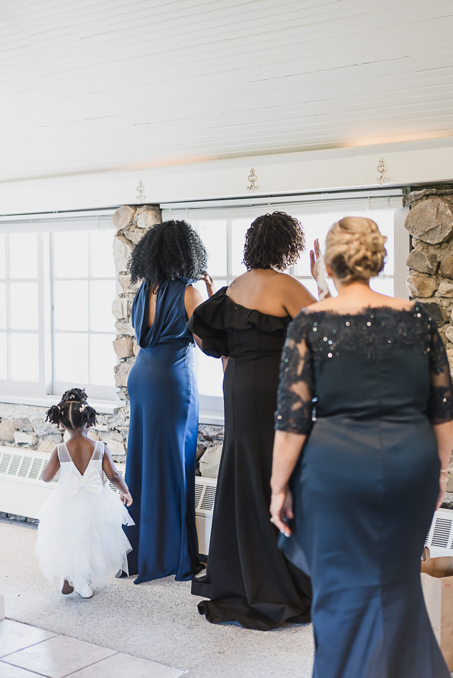 An emerald and gold fall interracial Castle Farms wedding in Charlevoix Northern Michigan by top-rated Northern Michigan wedding photography team Kari Dawson + Co.