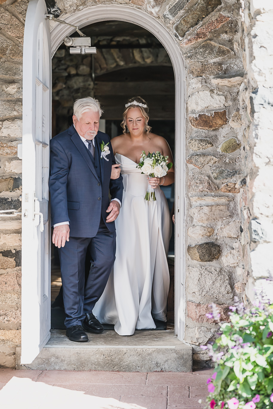 An emerald and gold fall interracial Castle Farms wedding in Charlevoix Northern Michigan by top-rated Northern Michigan wedding photography team Kari Dawson + Co.