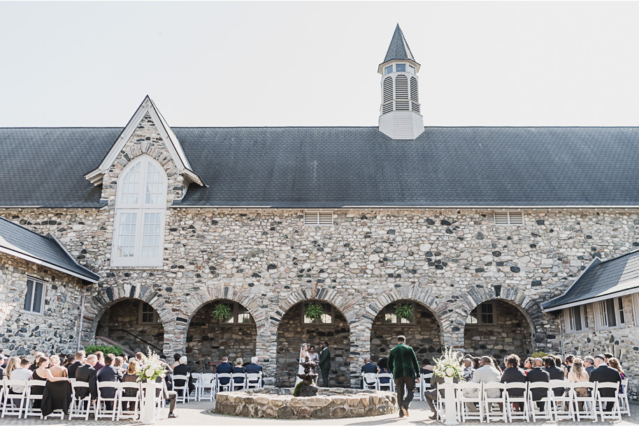 An emerald and gold fall interracial Castle Farms wedding in Charlevoix Northern Michigan by top-rated Northern Michigan wedding photography team Kari Dawson + Co.