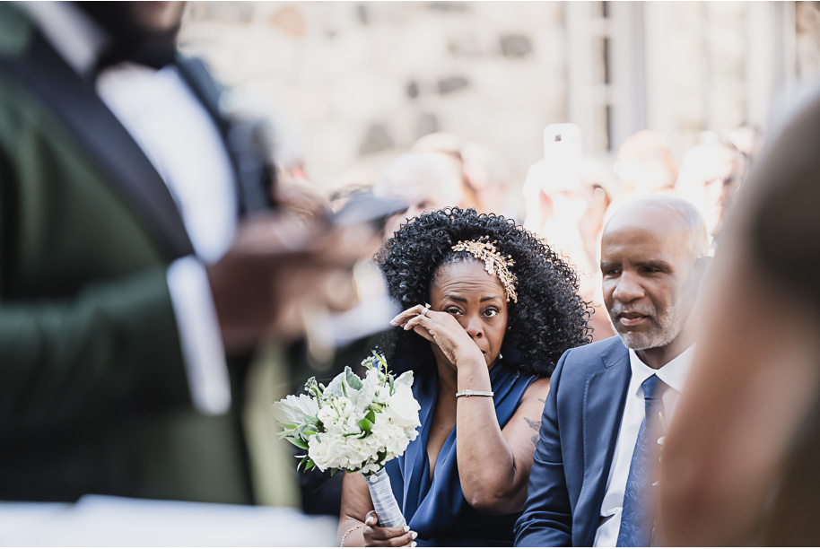 An emerald and gold fall interracial Castle Farms wedding in Charlevoix Northern Michigan by top-rated Northern Michigan wedding photography team Kari Dawson + Co.
