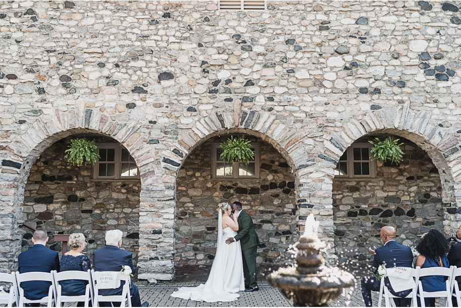 An emerald and gold fall interracial Castle Farms wedding in Charlevoix Northern Michigan by top-rated Northern Michigan wedding photography team Kari Dawson + Co.