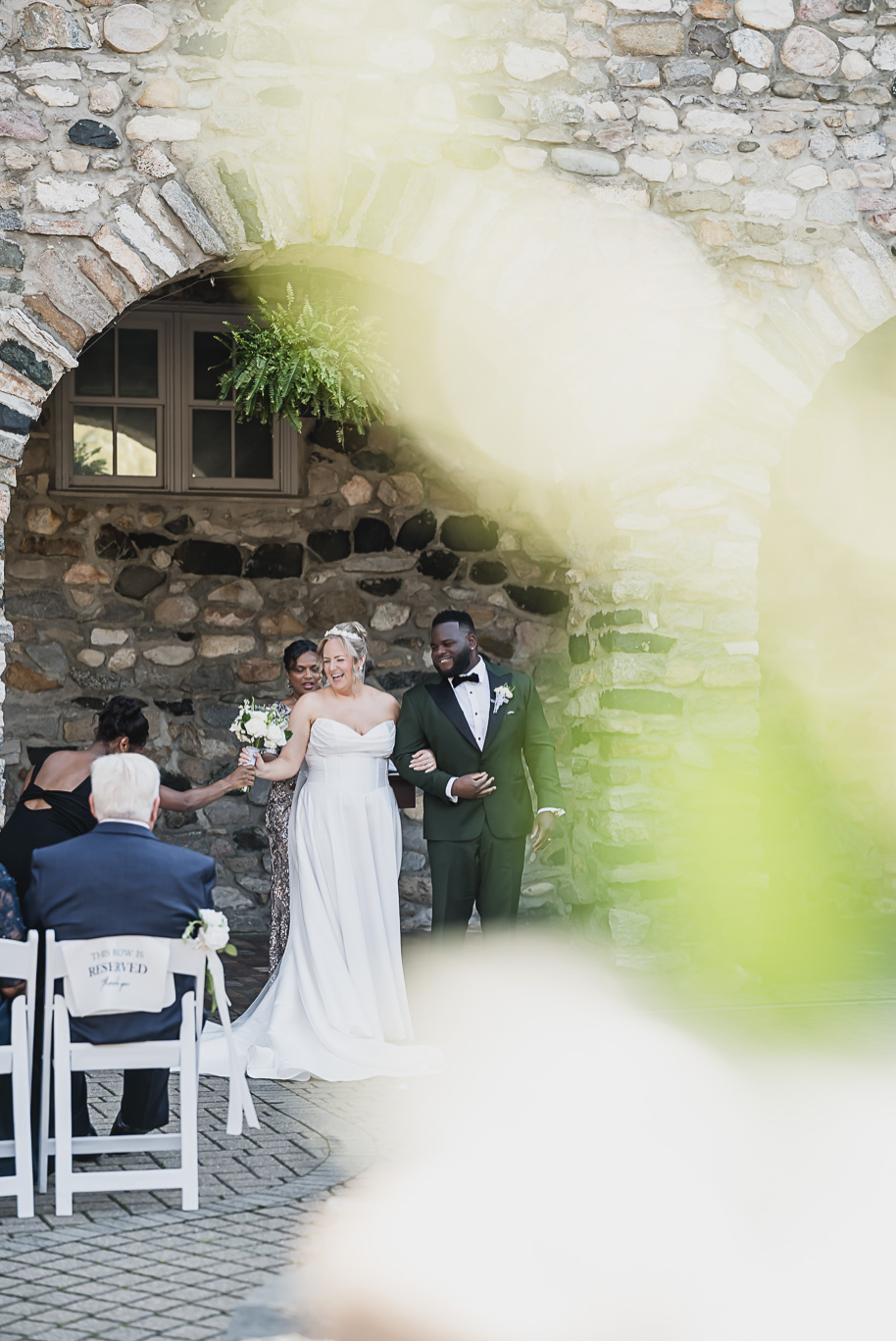 An emerald and gold fall interracial Castle Farms wedding in Charlevoix Northern Michigan by top-rated Northern Michigan wedding photography team Kari Dawson + Co.