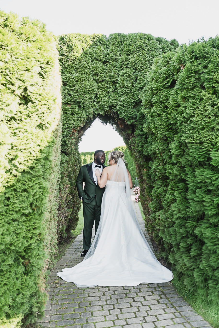 An emerald and gold fall interracial Castle Farms wedding in Charlevoix Northern Michigan by top-rated Northern Michigan wedding photography team Kari Dawson + Co.
