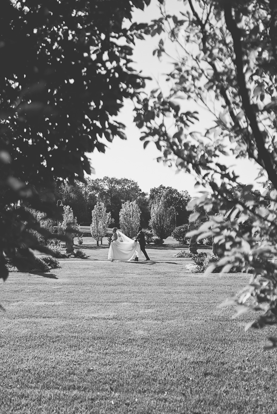 An emerald and gold fall interracial Castle Farms wedding in Charlevoix Northern Michigan by top-rated Northern Michigan wedding photography team Kari Dawson + Co.