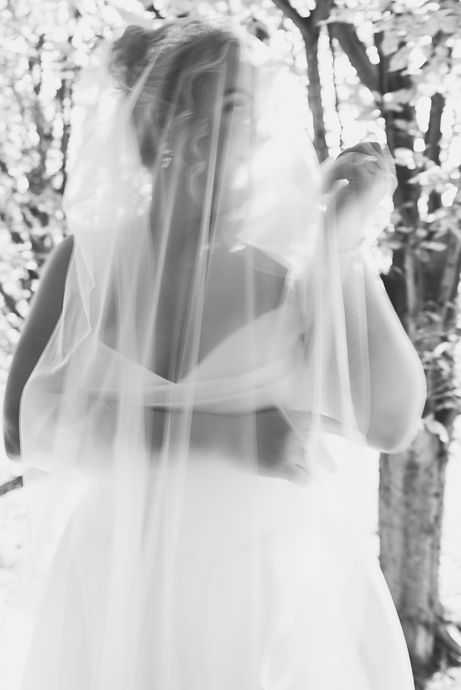An emerald and gold fall interracial Castle Farms wedding in Charlevoix Northern Michigan by top-rated Northern Michigan wedding photography team Kari Dawson + Co.