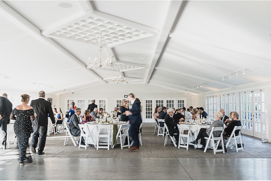 An emerald and gold fall interracial Castle Farms wedding in Charlevoix Northern Michigan by top-rated Northern Michigan wedding photography team Kari Dawson + Co.