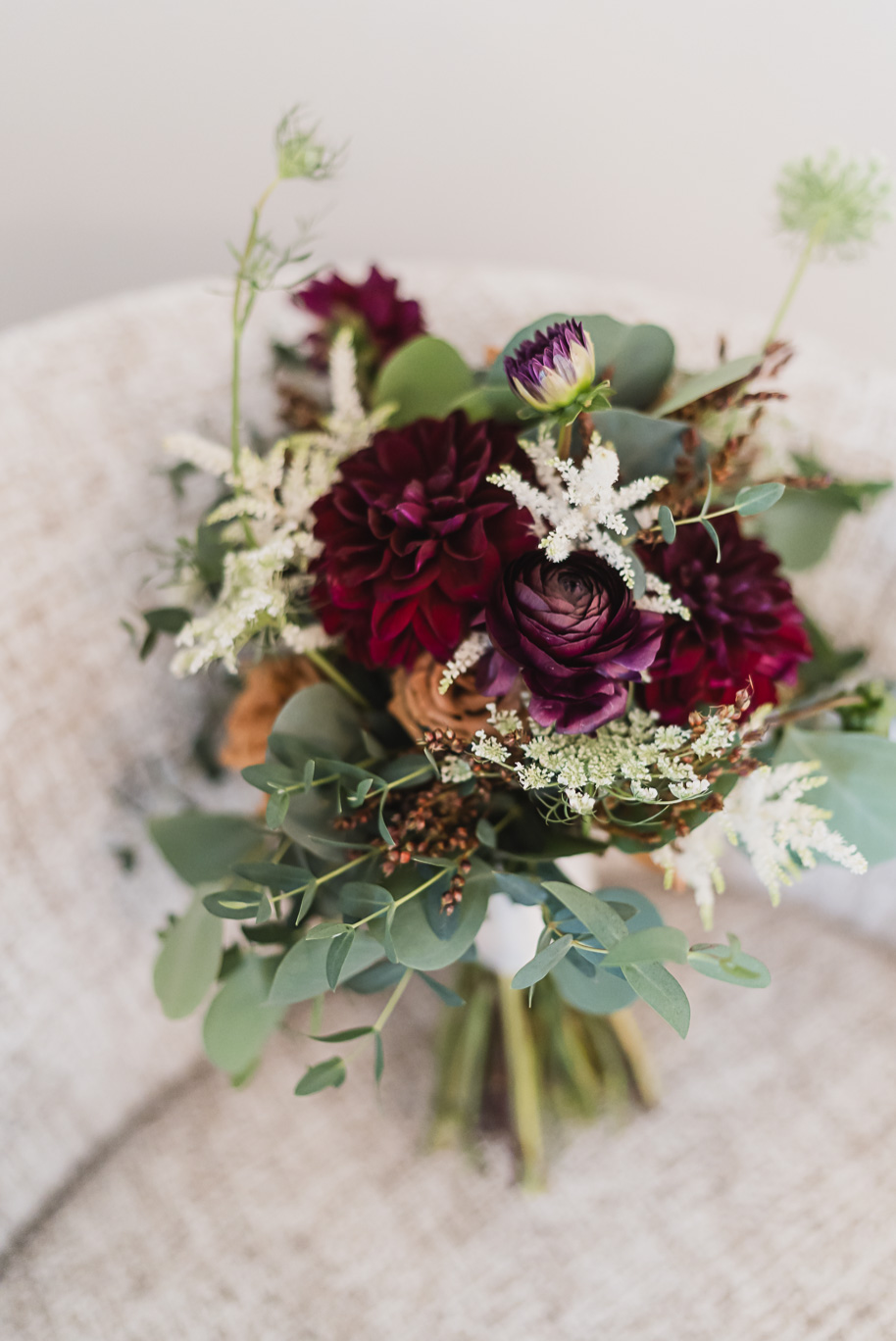 Romantic Royal Park Hotel wedding in Michigan with classic navy and sage details, warm family moments, and timeless photography by Kari Dawson.