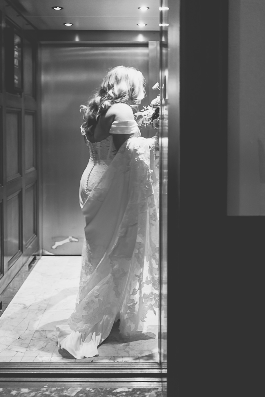 Romantic Royal Park Hotel wedding in Michigan with classic navy and sage details, warm family moments, and timeless photography by Kari Dawson.
