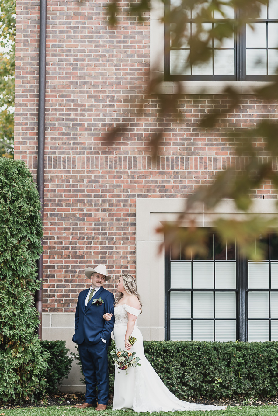 A fall Royal Park wedding in Rochester, Michigan with olive, sage, navy, and gold details captured by top-rated photographer Kari Dawson + Co.