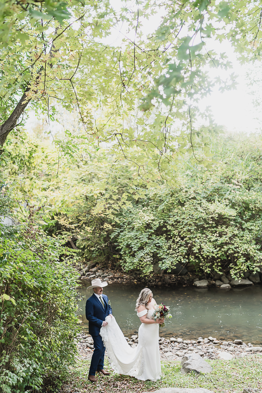 Romantic Royal Park Hotel wedding in Michigan with classic navy and sage details, warm family moments, and timeless photography by Kari Dawson.