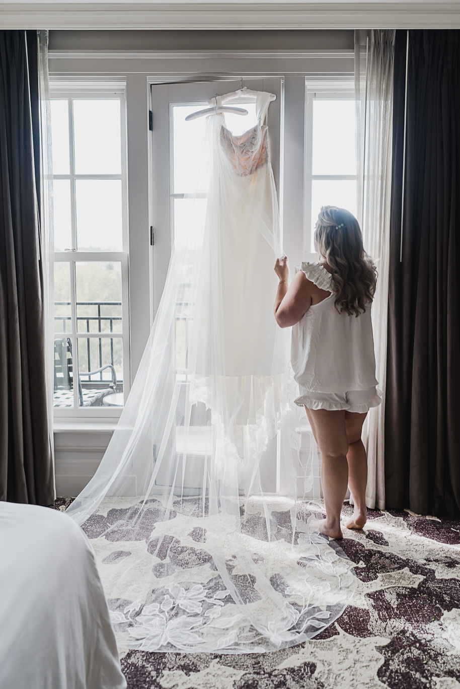 Elegant fall wedding at the Royal Park Hotel in Rochester, MI featuring navy and sage tones photographed by luxury wedding photographer Kari Dawson.