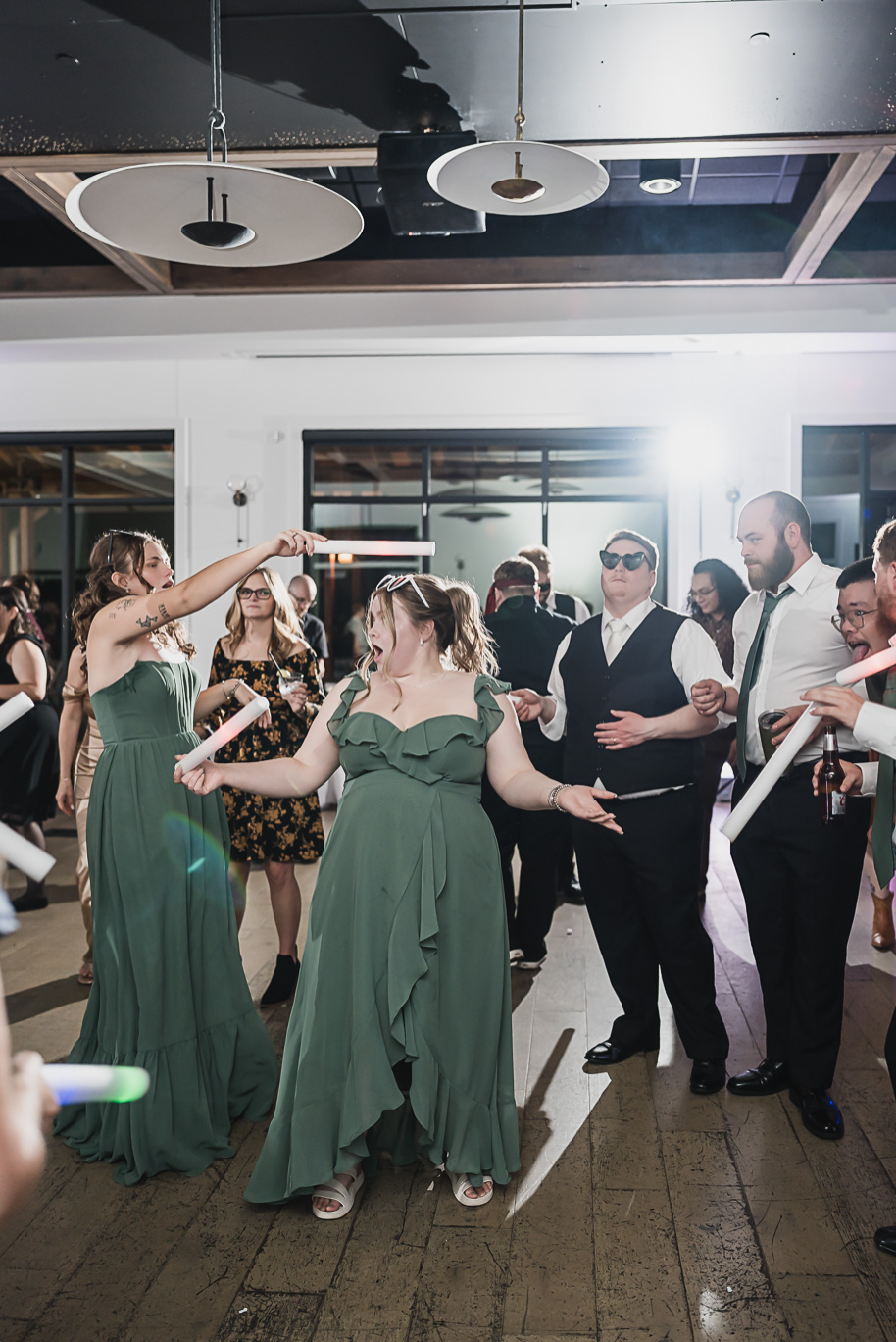 A warm fall Bay Pointe Woods wedding in Northern Michigan with sage and white details, emotional family legacy, and timeless design. Captured by Kari Dawson + Co.