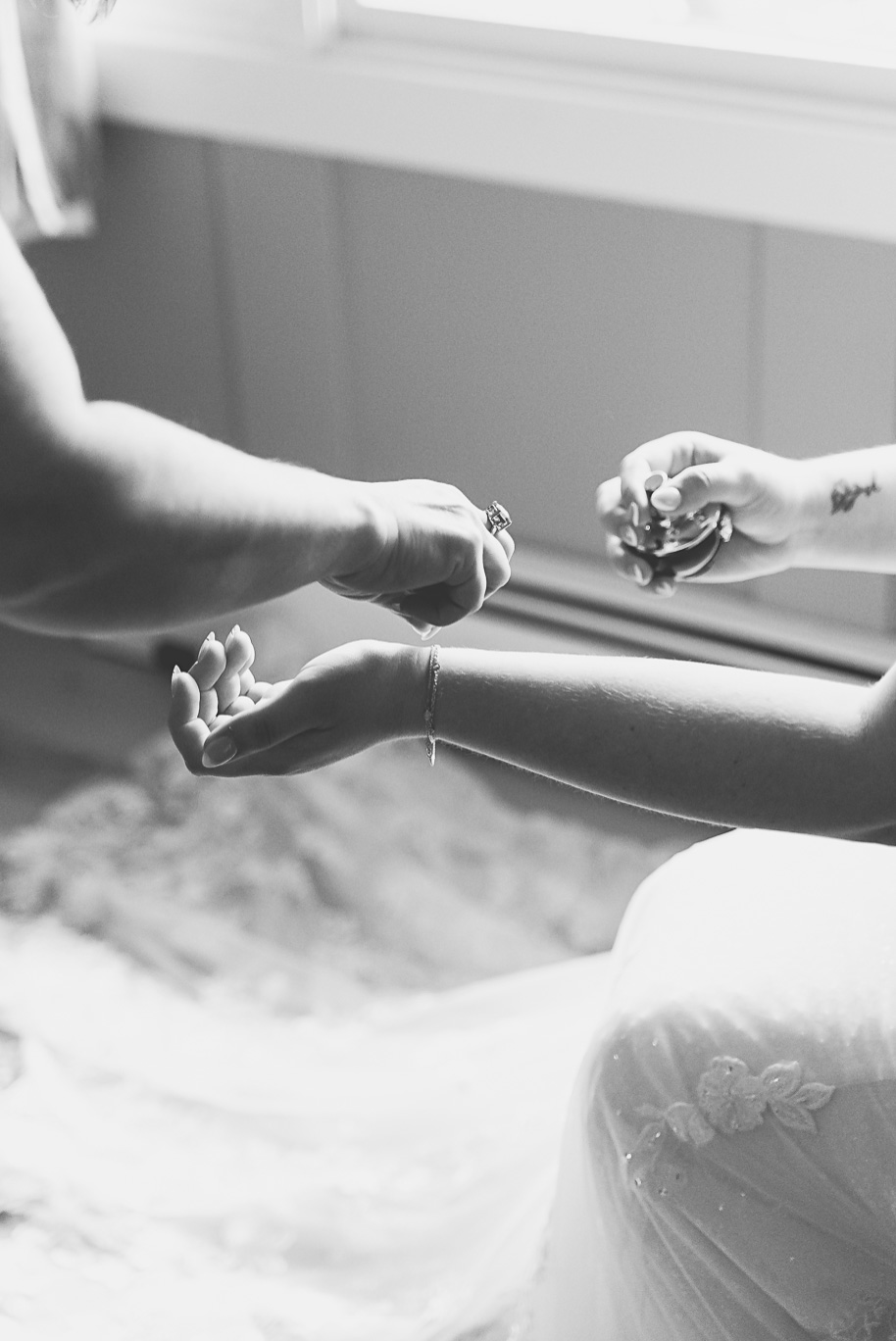 A fall Bay Pointe Woods wedding in Shelbyville, Michigan, featuring white and sage details, black-tie elegance, and heartfelt family legacy. Photographed by Kari Dawson + Co.
