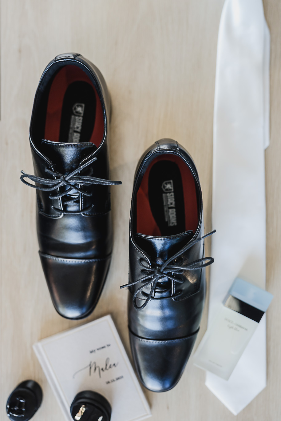 A fall Bay Pointe Woods wedding in Shelbyville, Michigan, featuring white and sage details, black-tie elegance, and heartfelt family legacy. Photographed by Kari Dawson + Co.
