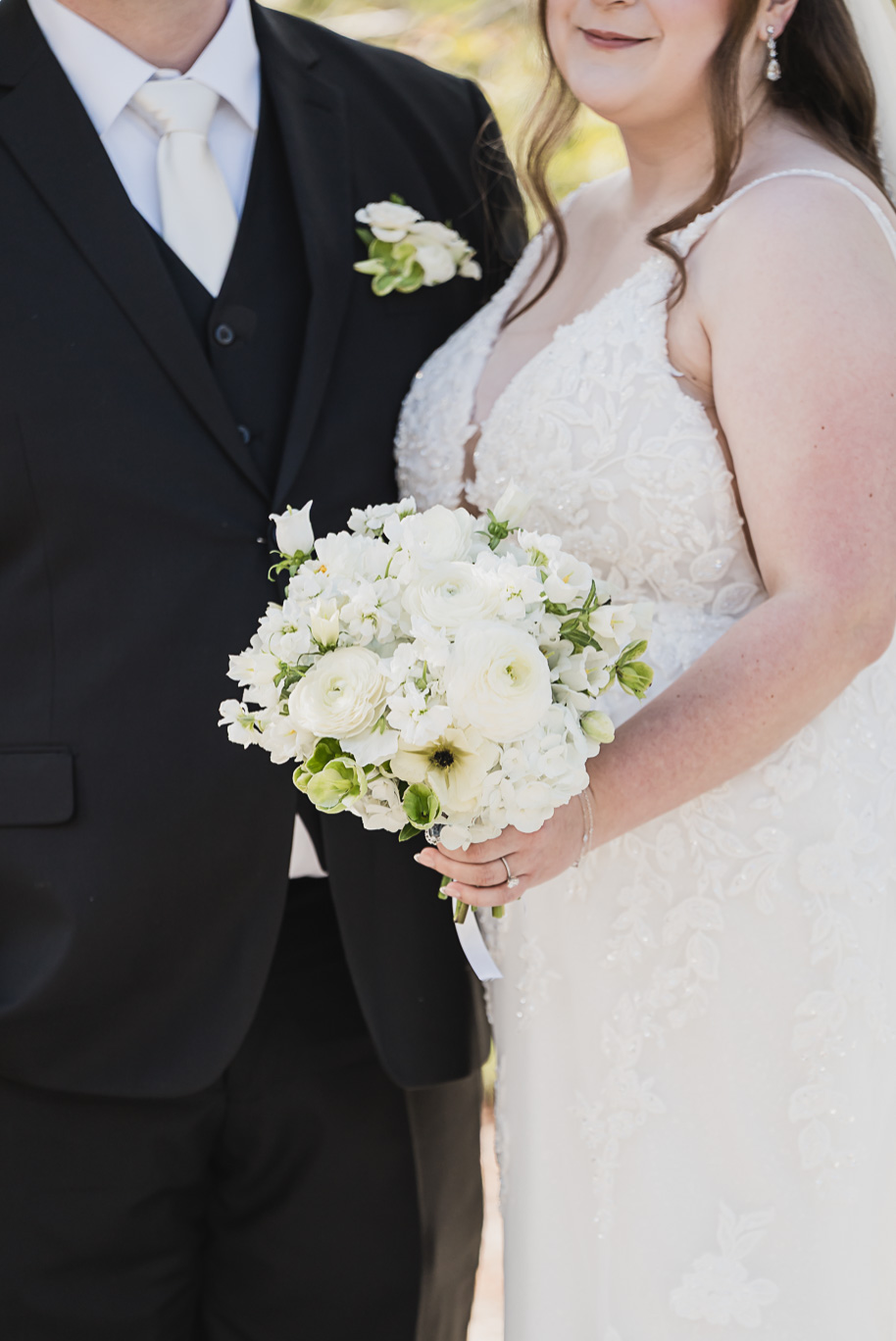 A fall Bay Pointe Woods wedding in Shelbyville, Michigan, featuring white and sage details, black-tie elegance, and heartfelt family legacy. Photographed by Kari Dawson + Co.
