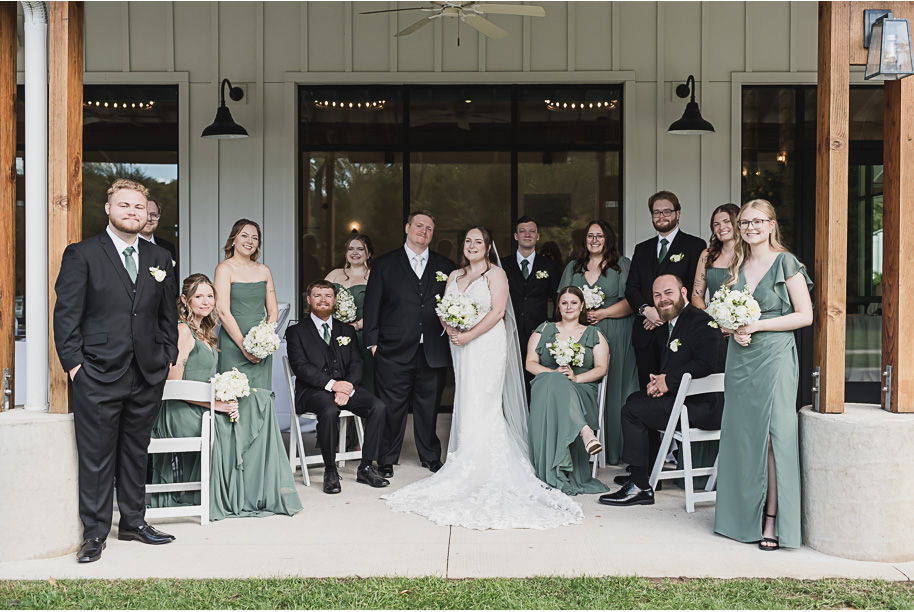 A fall Bay Pointe Woods wedding in Shelbyville, Michigan, featuring white and sage details, black-tie elegance, and heartfelt family legacy. Photographed by Kari Dawson + Co.
