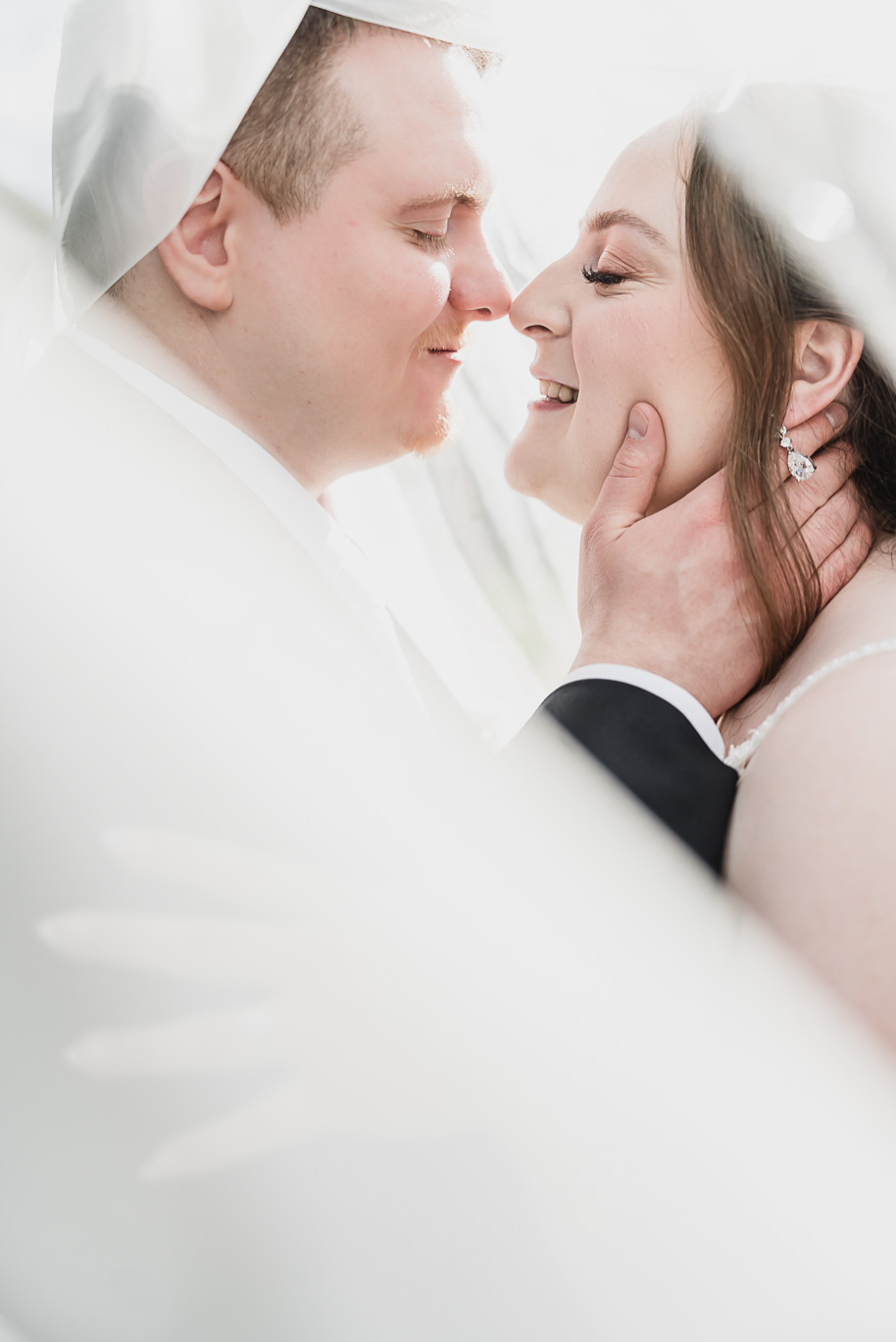 A fall Bay Pointe Woods wedding in Shelbyville, Michigan, featuring white and sage details, black-tie elegance, and heartfelt family legacy. Photographed by Kari Dawson + Co.
