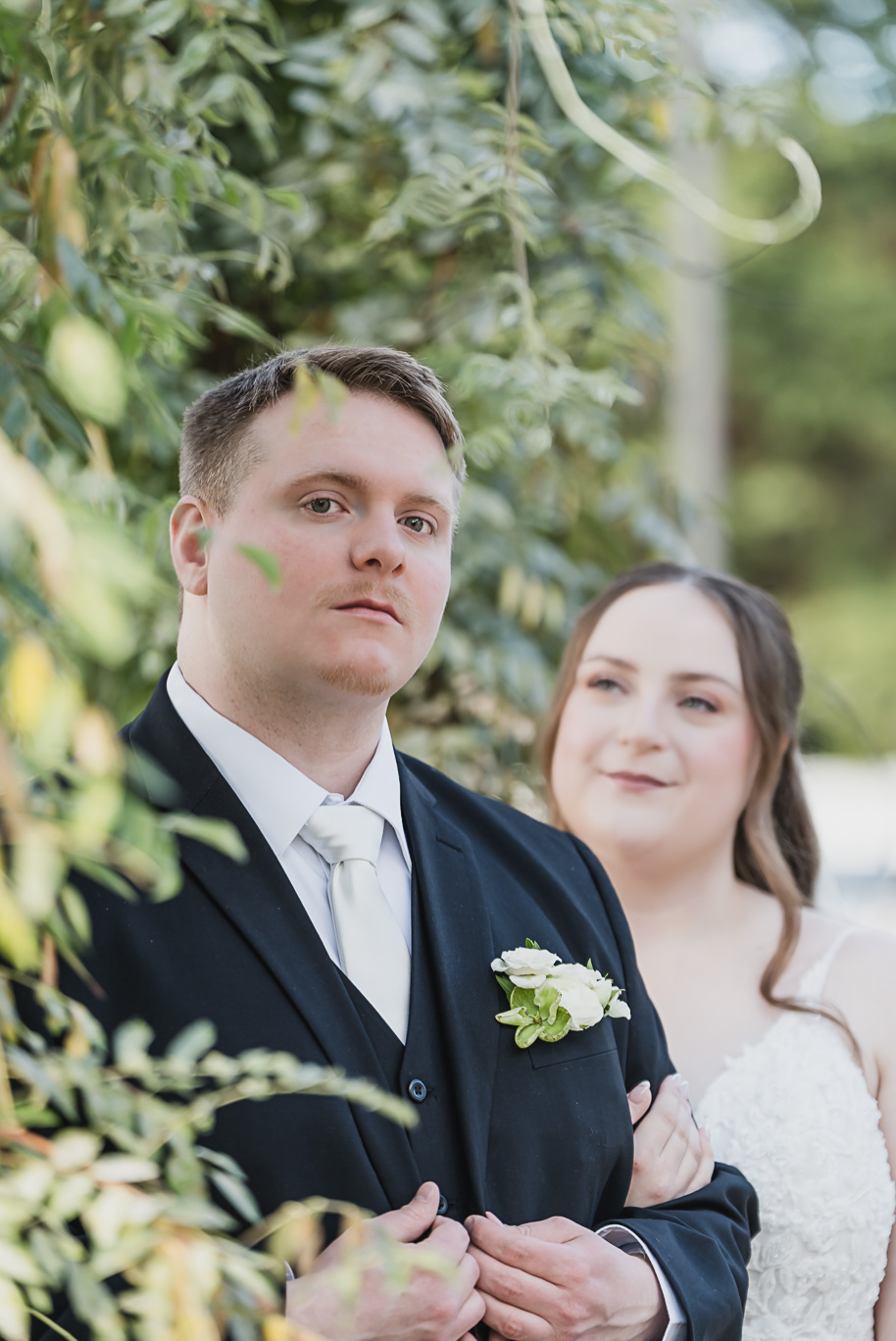 A fall Bay Pointe Woods wedding in Shelbyville, Michigan, featuring white and sage details, black-tie elegance, and heartfelt family legacy. Photographed by Kari Dawson + Co.

