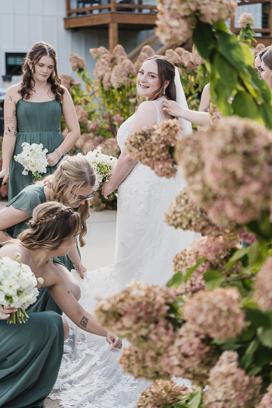 A warm fall Bay Pointe Woods wedding in Northern Michigan with sage and white details, emotional family legacy, and timeless design. Captured by Kari Dawson + Co.