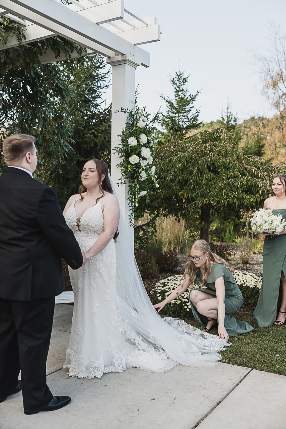 A warm fall Bay Pointe Woods wedding in Northern Michigan with sage and white details, emotional family legacy, and timeless design. Captured by Kari Dawson + Co.