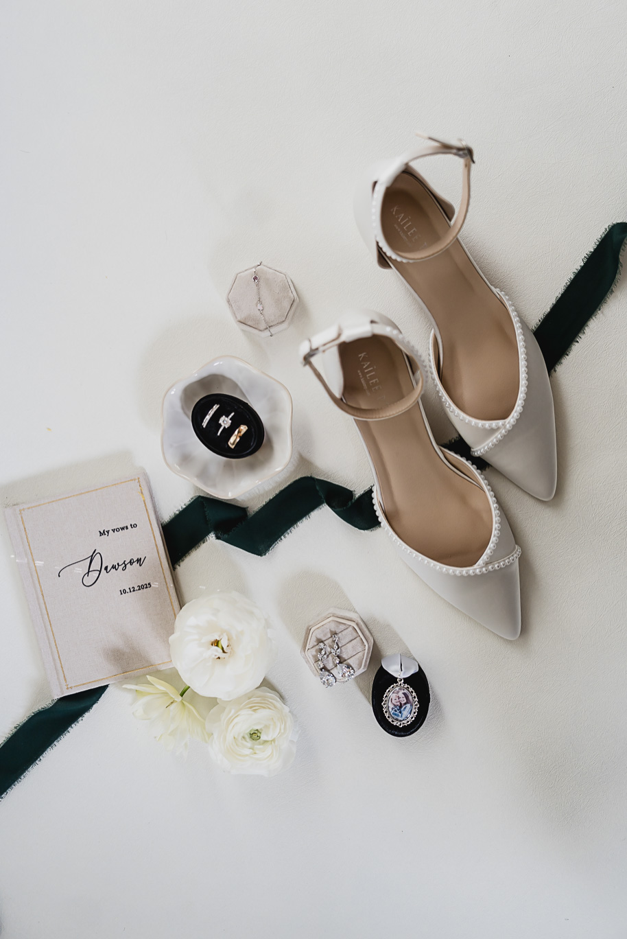 A fall Bay Pointe Woods wedding in Shelbyville, Michigan, featuring white and sage details, black-tie elegance, and heartfelt family legacy. Photographed by Kari Dawson + Co.
