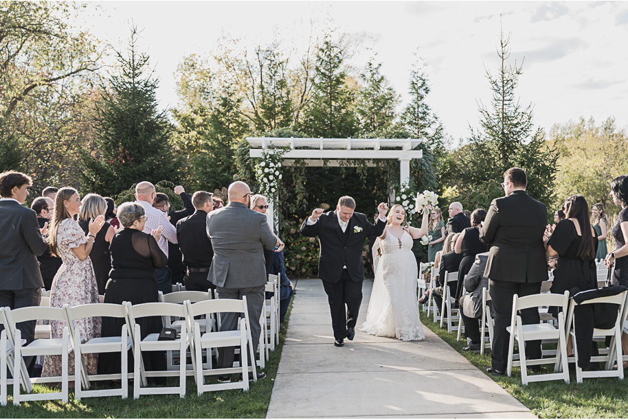 A warm fall Bay Pointe Woods wedding in Northern Michigan with sage and white details, emotional family legacy, and timeless design. Captured by Kari Dawson + Co.