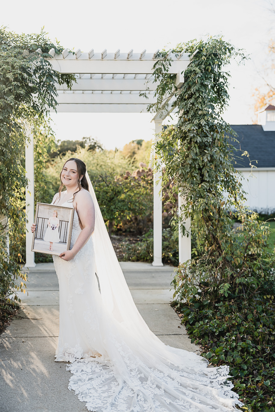 A warm fall Bay Pointe Woods wedding in Northern Michigan with sage and white details, emotional family legacy, and timeless design. Captured by Kari Dawson + Co.