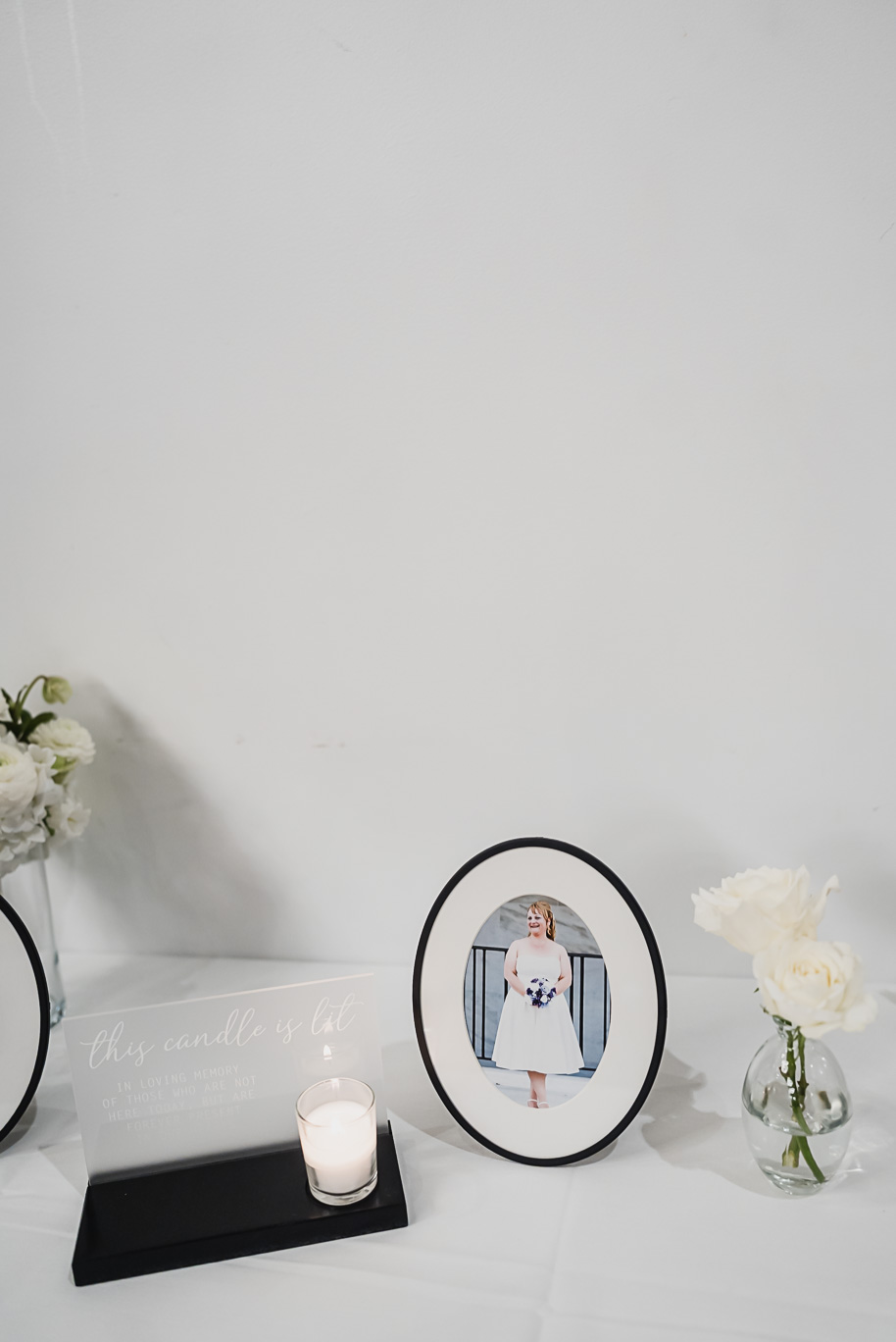 A warm fall Bay Pointe Woods wedding in Northern Michigan with sage and white details, emotional family legacy, and timeless design. Captured by Kari Dawson + Co.