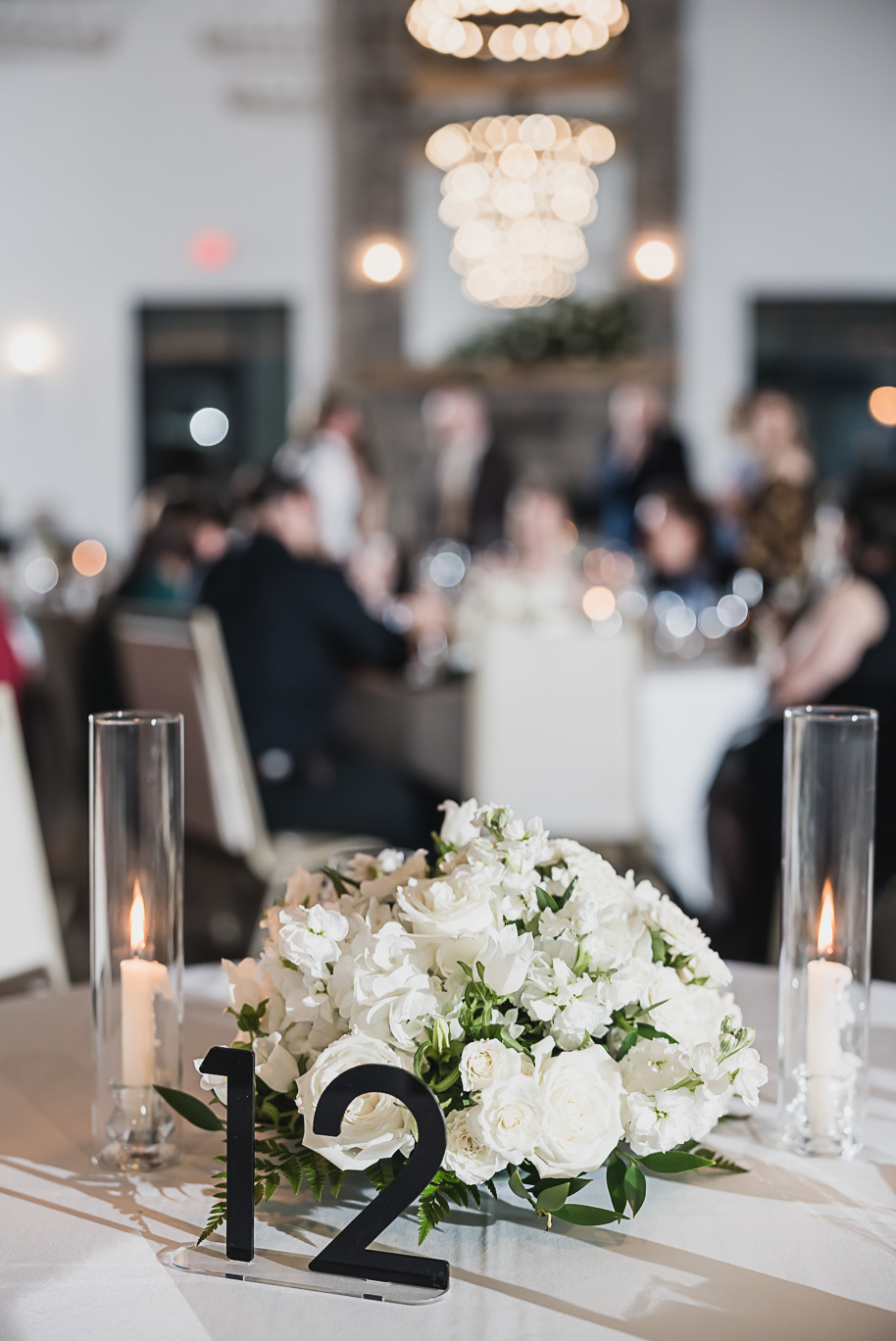 A warm fall Bay Pointe Woods wedding in Northern Michigan with sage and white details, emotional family legacy, and timeless design. Captured by Kari Dawson + Co.
