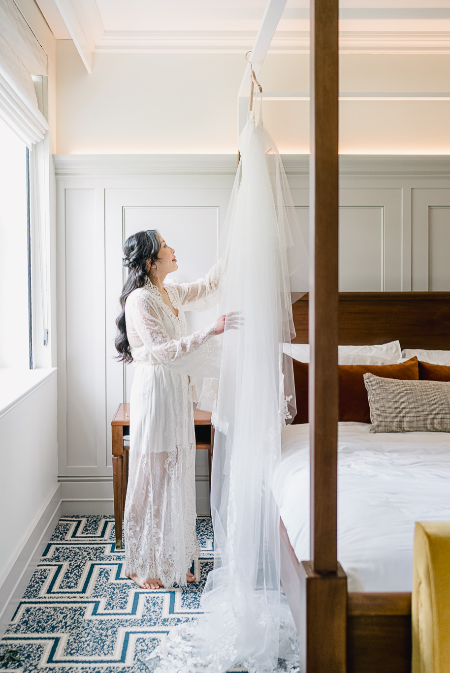 Linda with her Louvre Couture wedding gown as she prepared in her suite at the Dearborn Inn for her wedding day.